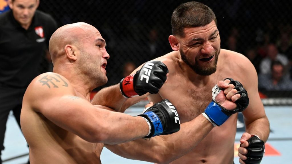 Nick Diaz "Bar Brawl" vs. Robbie Lawler and gives up the match for a strange reason in return after 6 years;  paying off