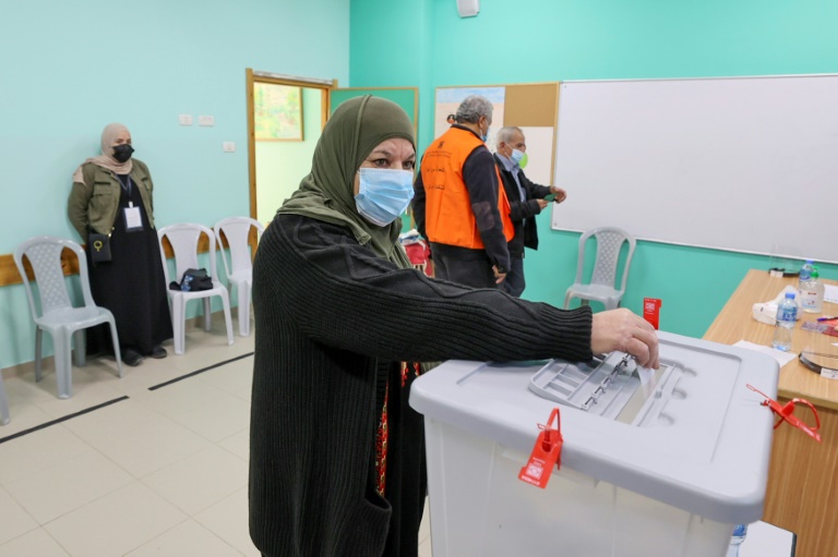 West Bank Palestinians begin voting in municipal elections
