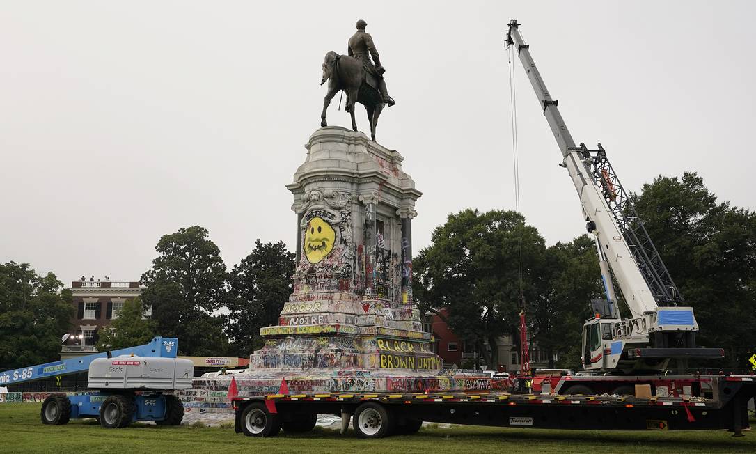 The time capsule was discovered when the team was working to remove the base that held the Robert E. Lee statue, and is believed to have been around for more than 130 years.  Photo: AP